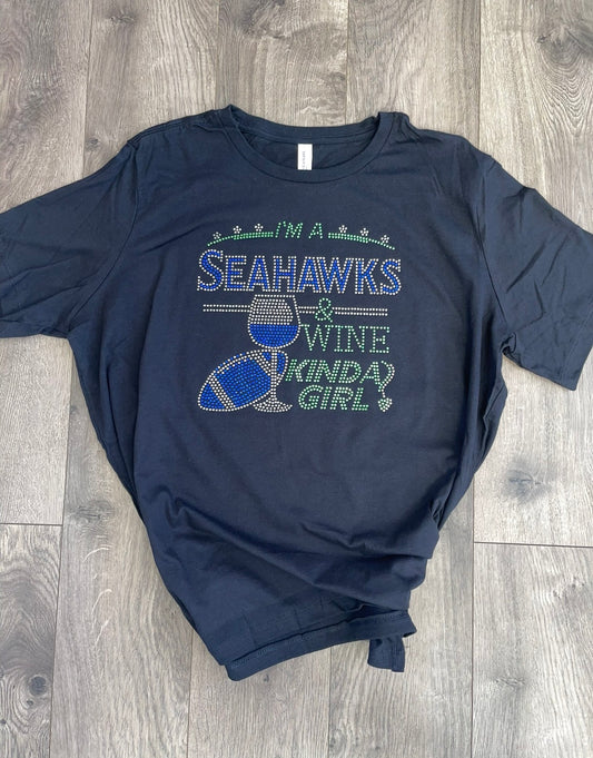 Seahawks and "Wine Kinda Girl" Rhinestone Bella-Canvas crew neck short sleeve shirt.